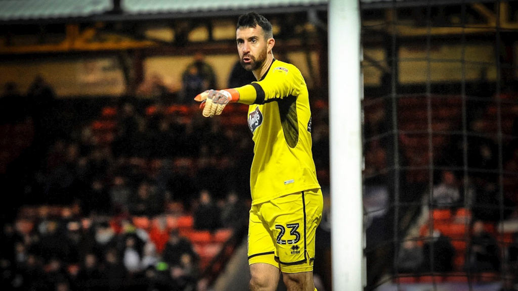 Russel in action for town