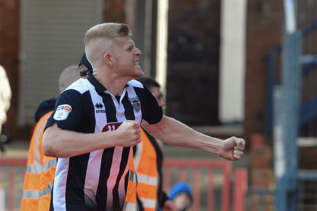 Grimsby Town in action against Oldham Athletic