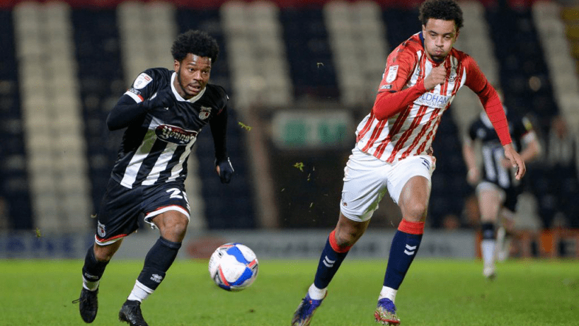 Grimsby Town in action against Oldham