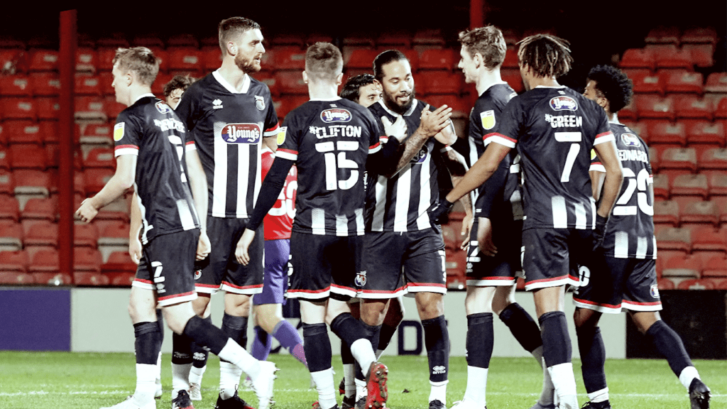 Grimsby Town in action v Exeter