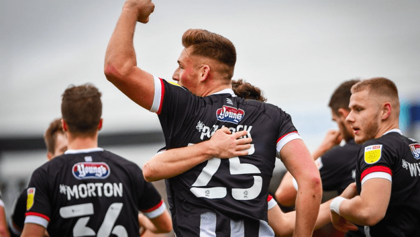 Pollock celebrating a goal