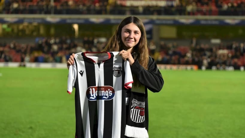 Blyth holding GTFC shirt