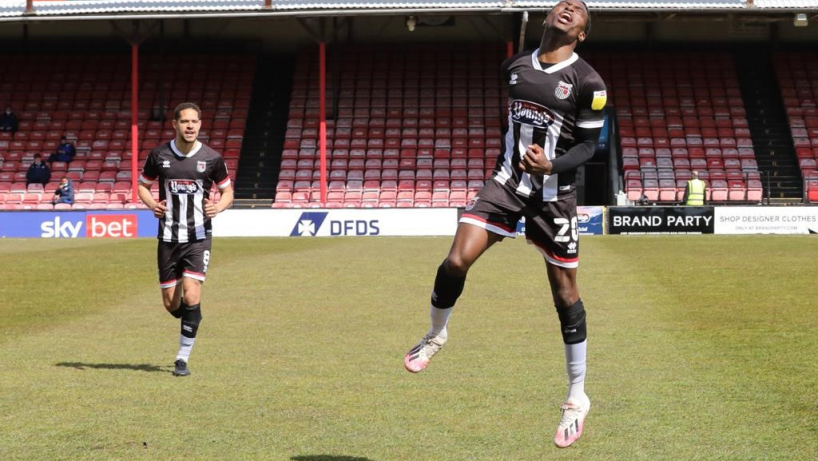 grimsby town players in action