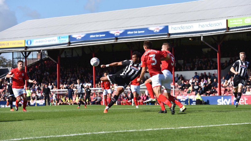 grimsby town players in action