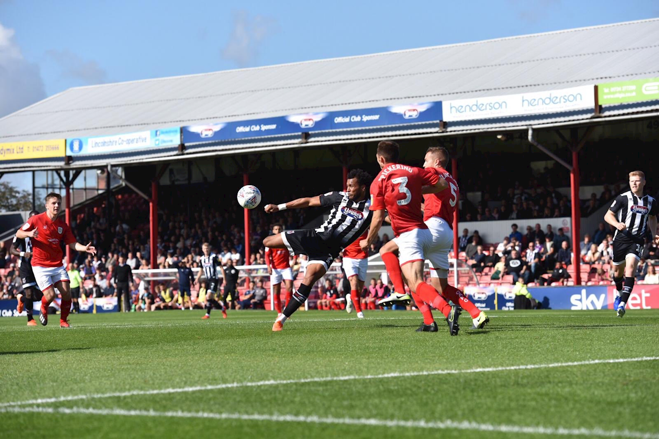 grimsby town players in action