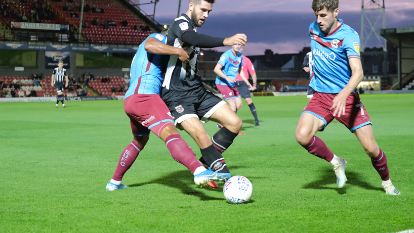 grimsby town players in action