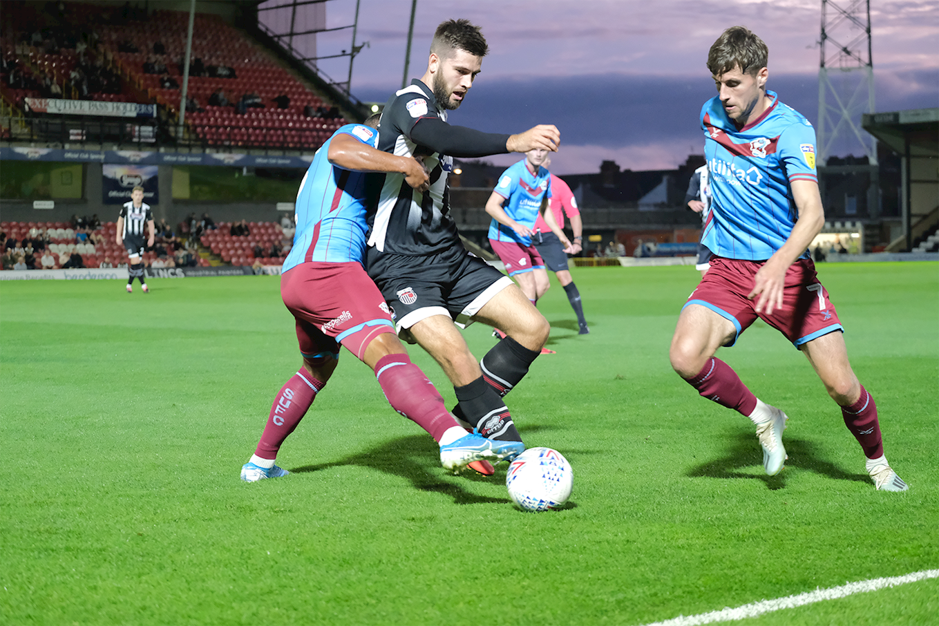 grimsby town players in action