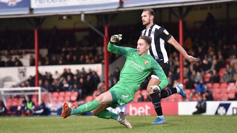 grimsby town players in action