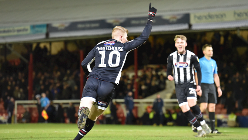 grimsby town players in action