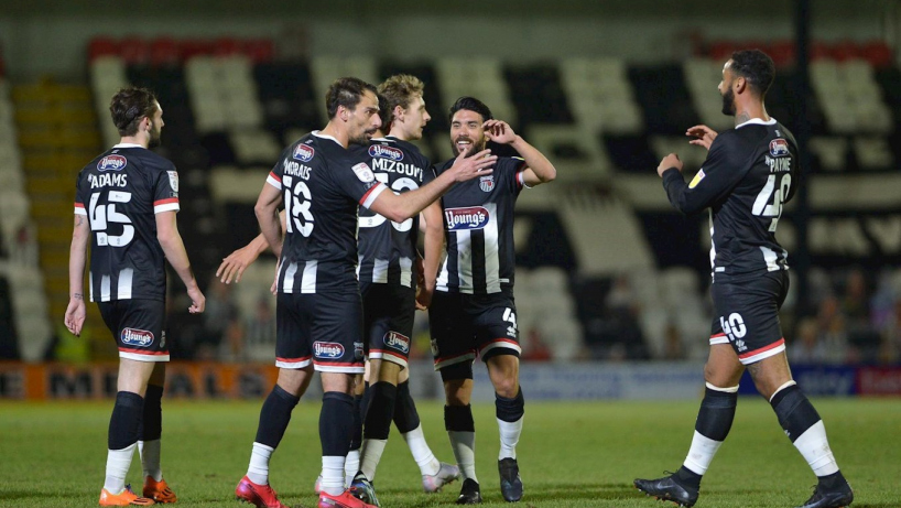 grimsby town players in action