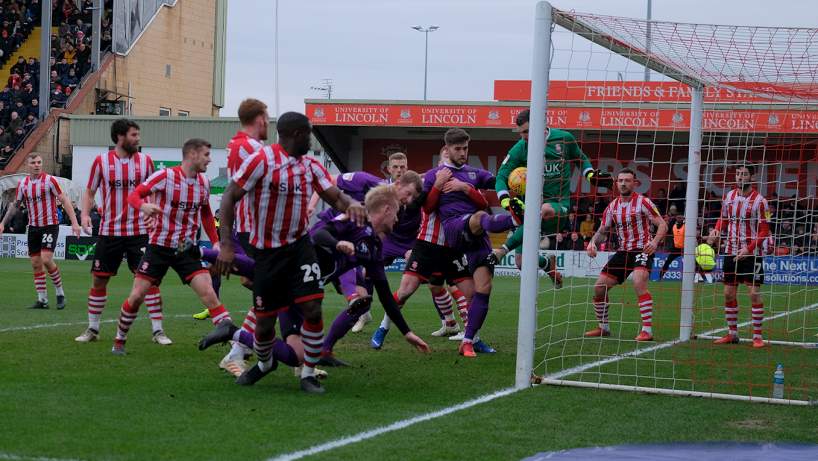 grimsby town players in action