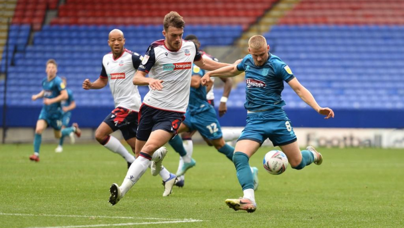 grimsby town players in action