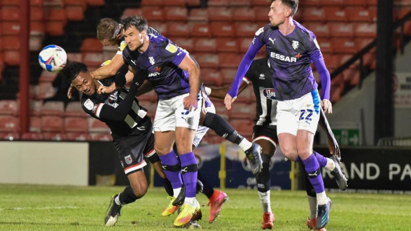 Grimsby town players in action