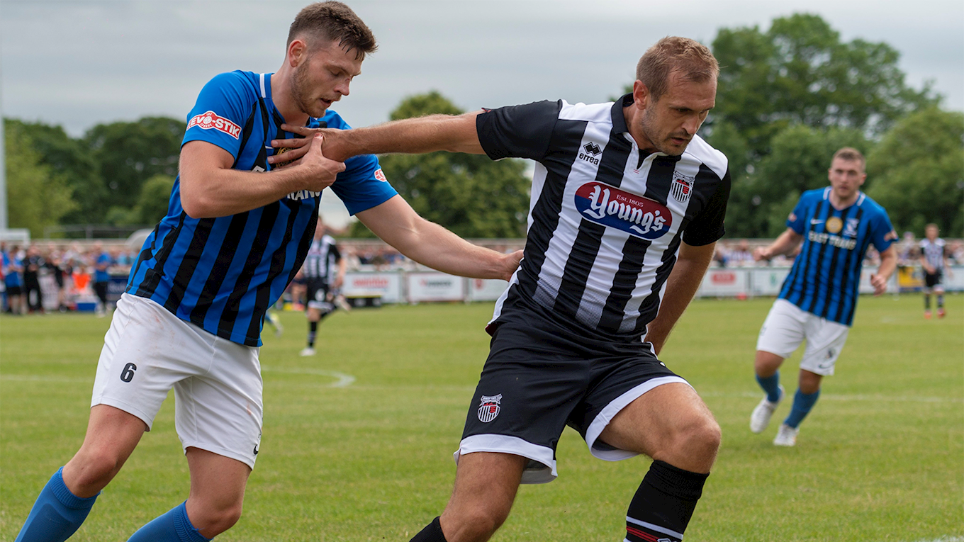Grimsby town players in action