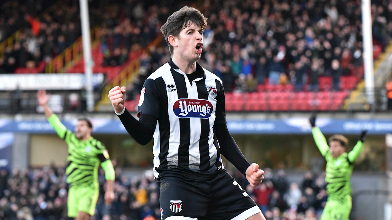 Grimsby town player celebrating a goal