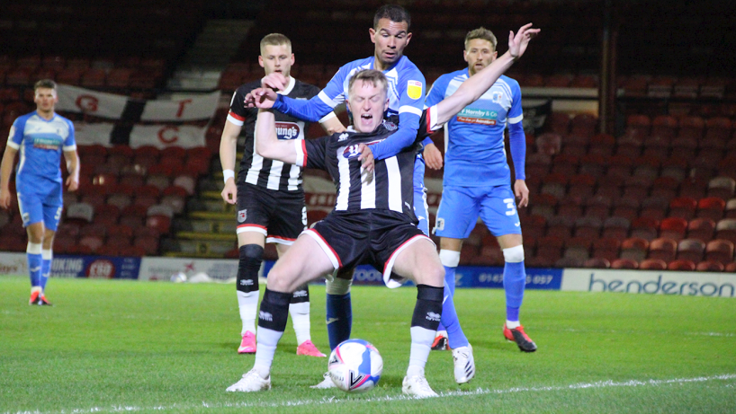 Grimsby town players in action