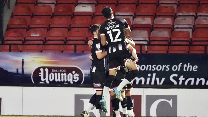 Grimsby town players in action