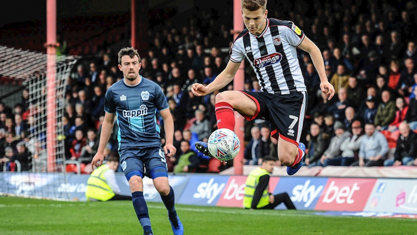 Grimsby town players in action