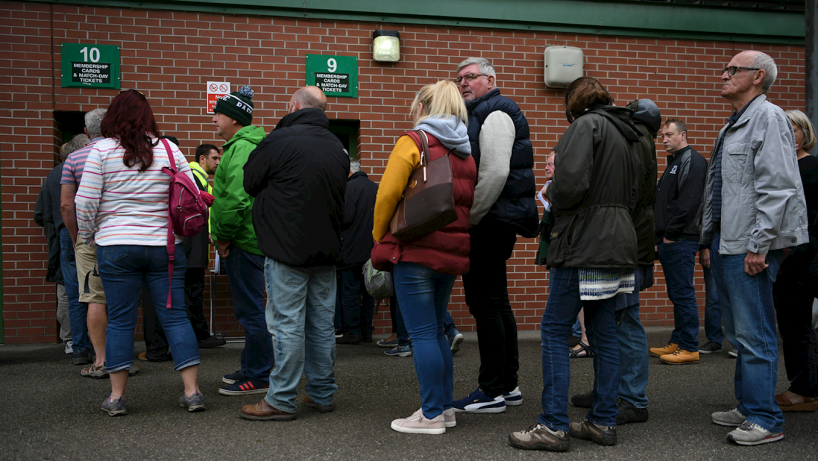 fans queuing to get in