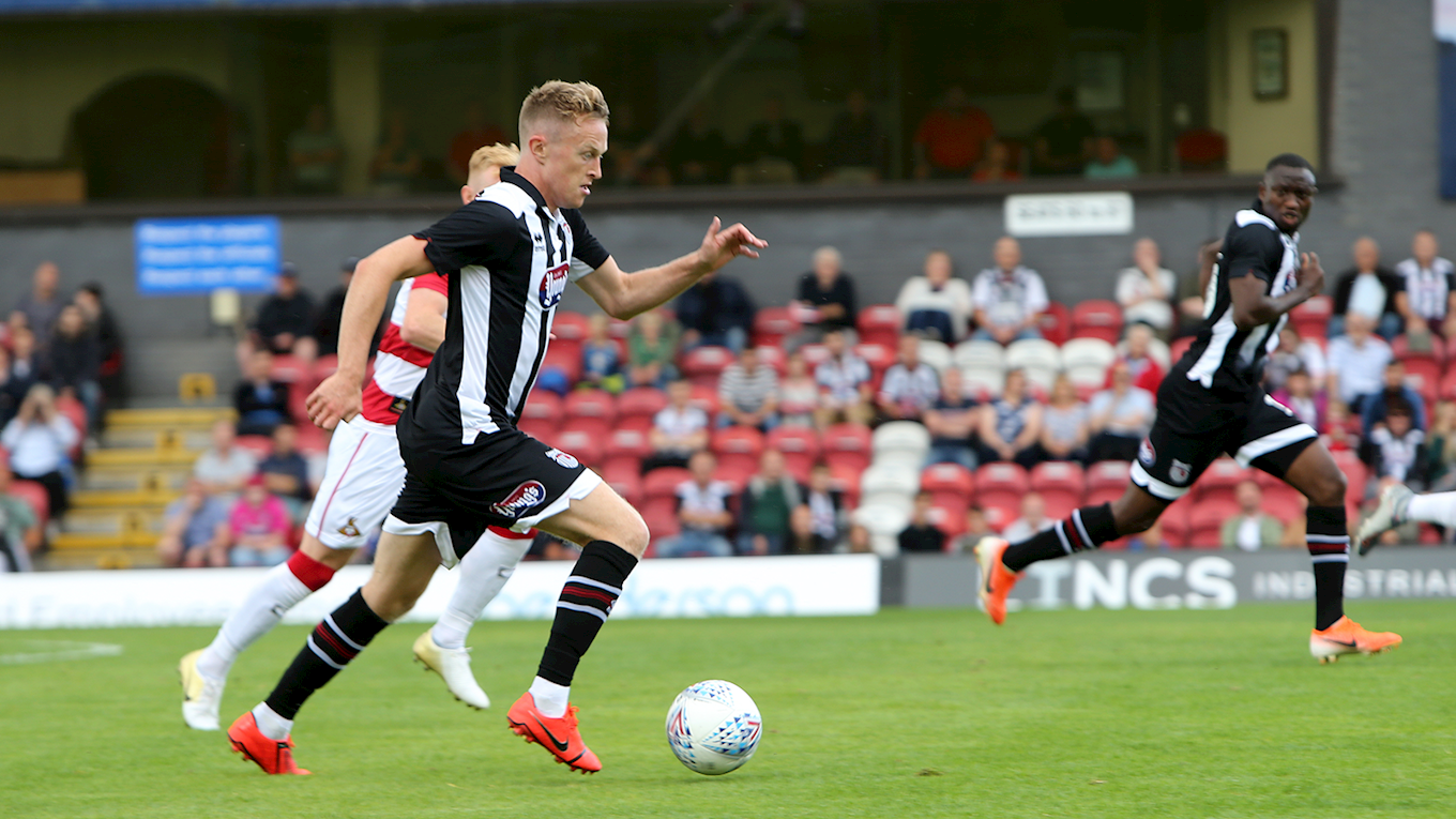 Grimsby town players in action