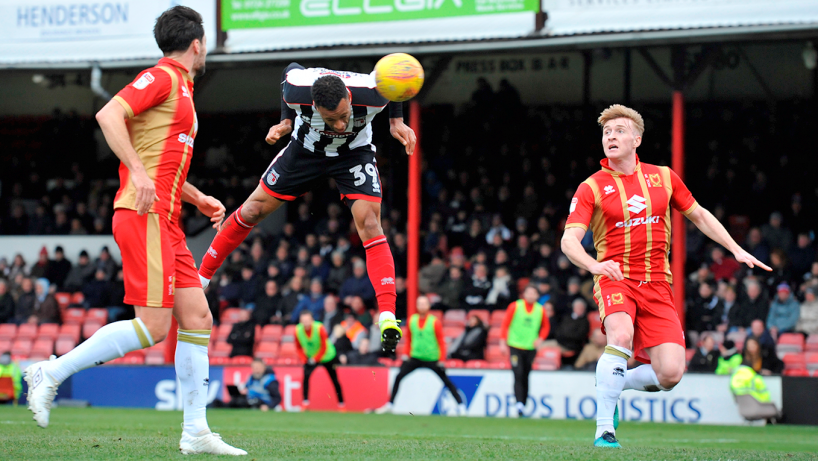 GTFC Player going for a header