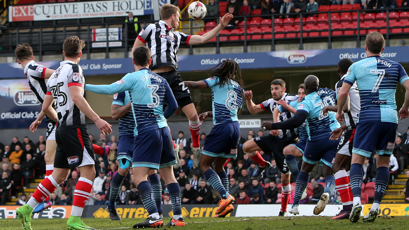 GTFC player going for a header