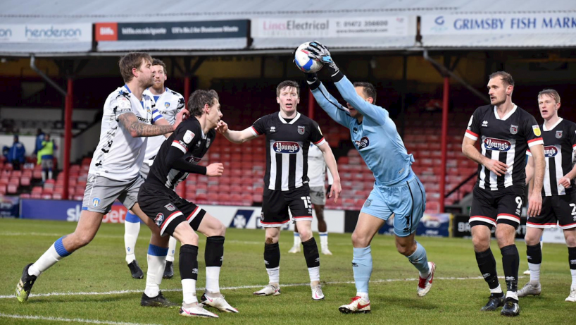 Grimsby town players in action