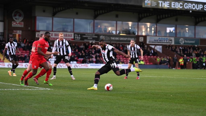 John Lewis in action against kidderminster harriers