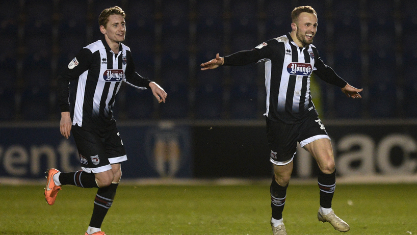 Grimsby town players in action