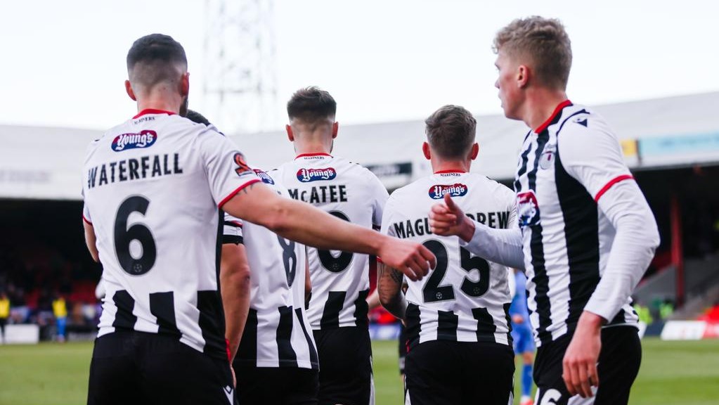 Grimsby Town players celebrating a goal