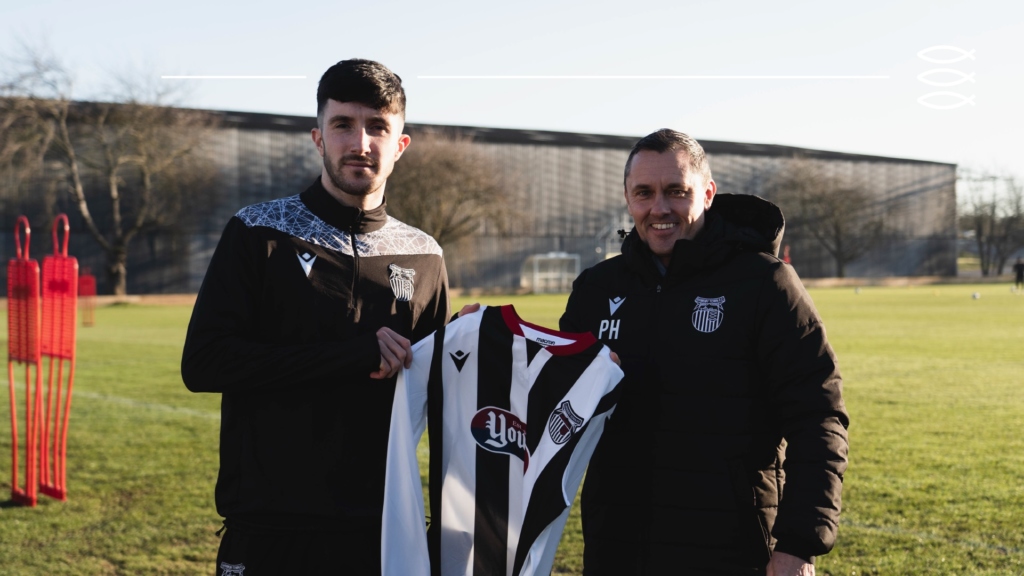 Danny Amos with Manager Paul Hurst