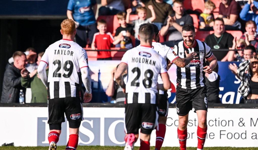 Waterfall, Taylor and Holohan celebrating a goal