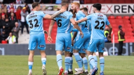 Grimsby Town FC players celebrating a goal against wrexham