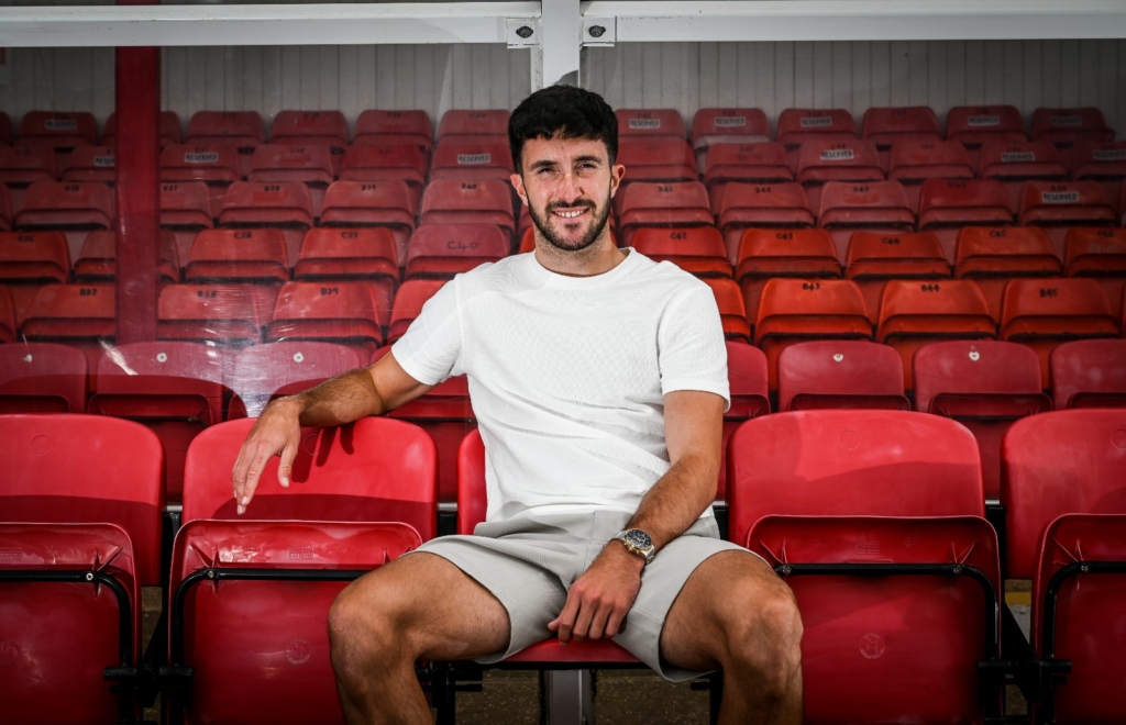 Danny Amos sat in the stands at blundell park