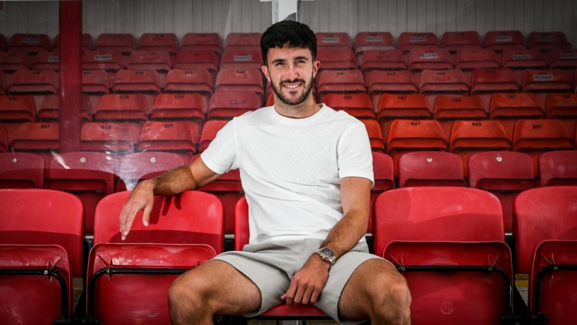 Danny Amos sat in the stands at blundell park