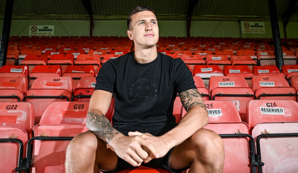 Jordan Cropper sat in the stands at blundell park