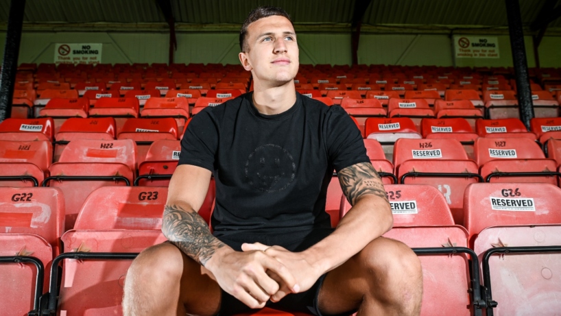 Jordan Cropper sat in the stands at blundell park