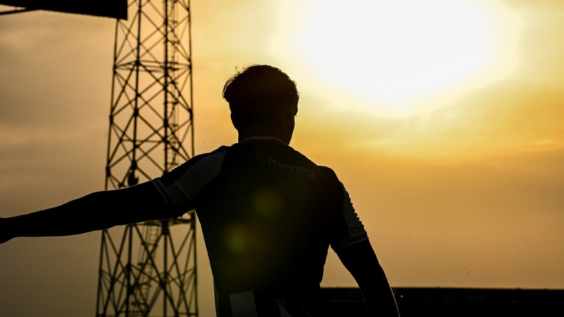 Jordan Maguire-Drew in front of a setting sun at Blundell Park