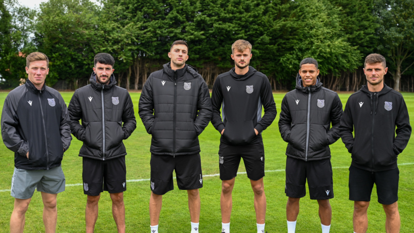 GTFC Players displaying a selection of our new 22/23 training and leisurewear