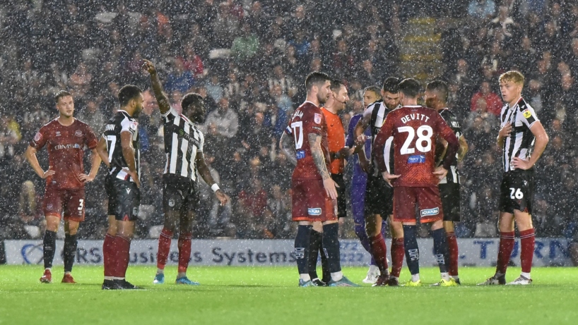 Players the rain at home against Carlisle United