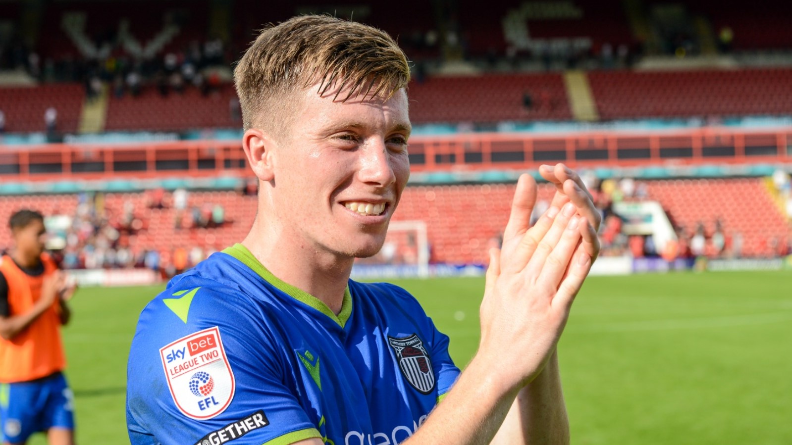 Harry Clifton Applauds The Fans At Walsall