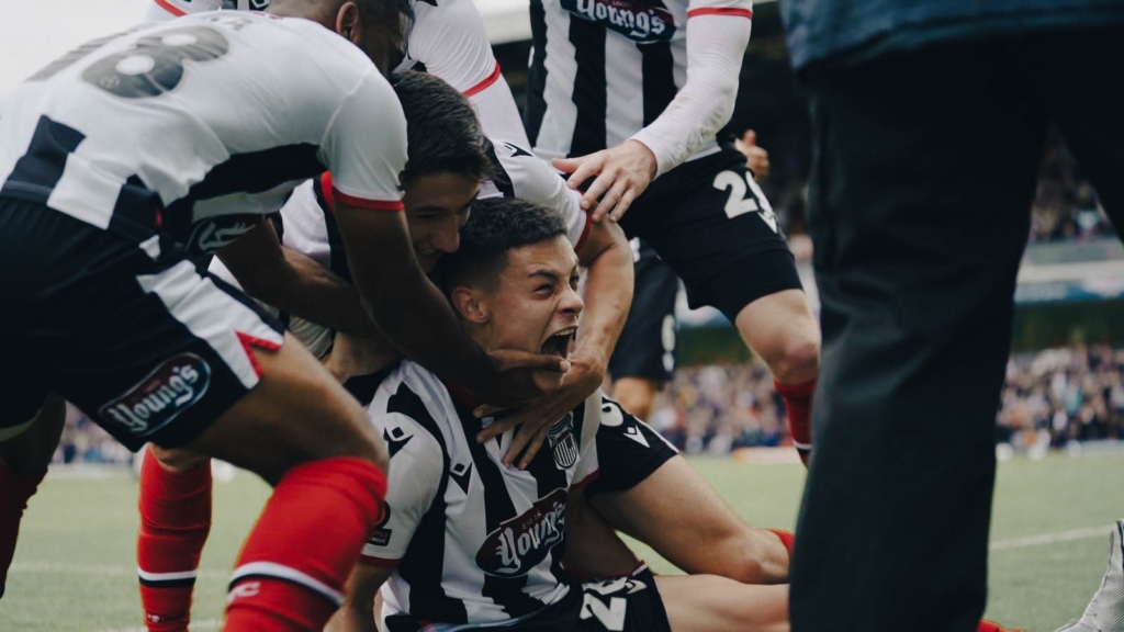 Alex Hunt celebrates scoring against Barnet