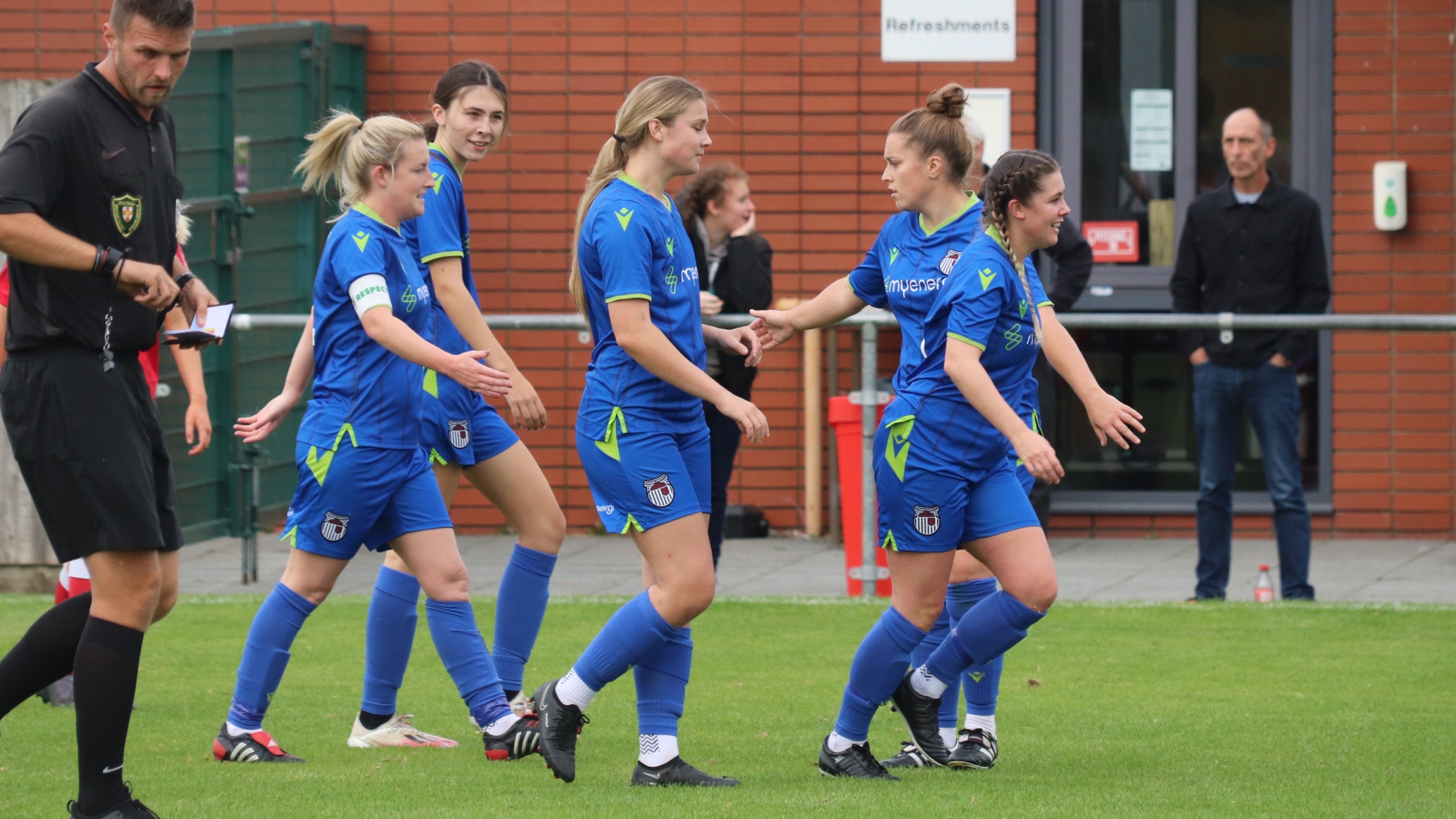 Grimsby Women celebrate scoring against Grimsby Borough